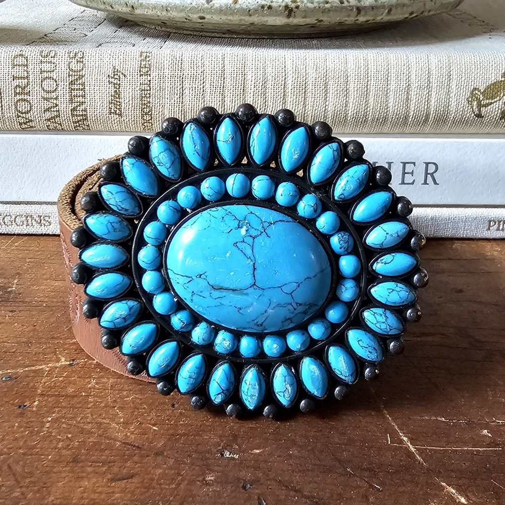 Lucky brand brown leather belt with turquoise stone belt buckle.
